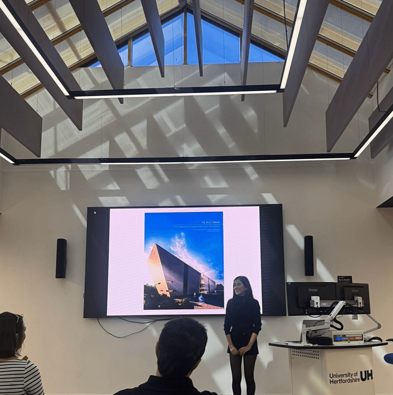 Alara Salih presenting The Split Frame at a RIBA East networking event